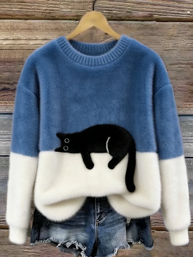 Cozy two-tone sweater with black cat motif, long sleeves and crew neck