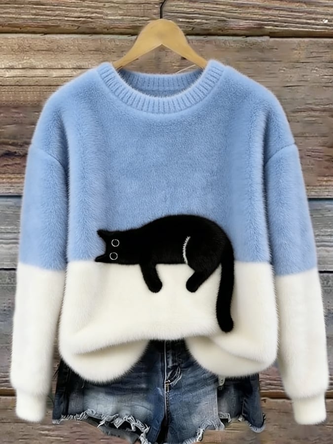 Cozy two-tone sweater with black cat motif, long sleeves and crew neck