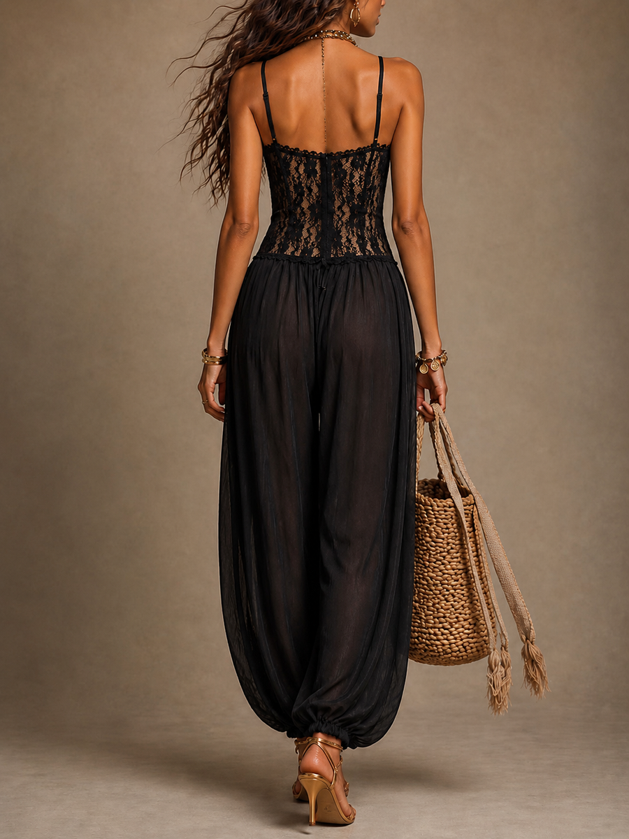 Zwarte damesjumpsuit met kanten bustier, soepelvallende harembroek