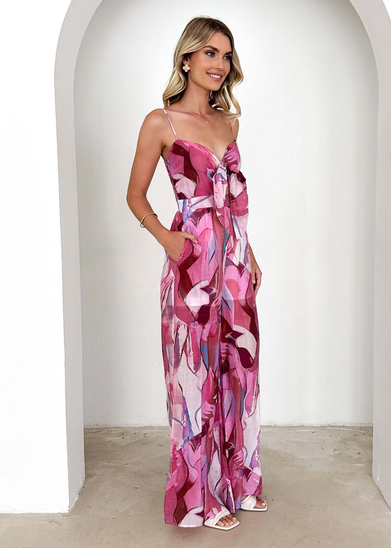 Lång jumpsuit för kvinnor med lövmönster, knuten urringning och grön färg