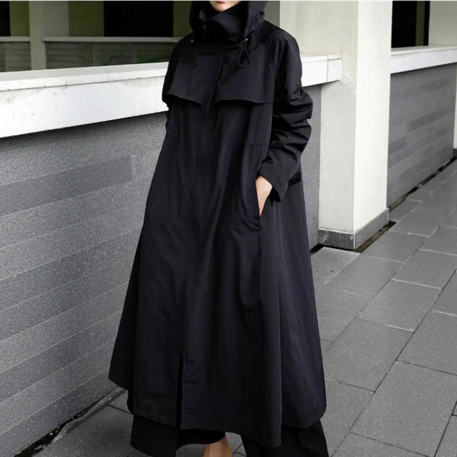 Long black hooded coat with a waist drawstring, casual style