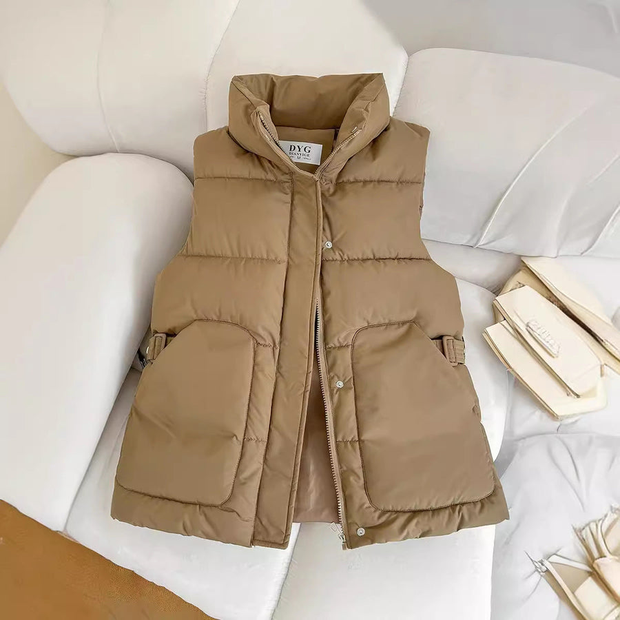 Solid-color quilted puffer vest with a stand collar and side flap pockets