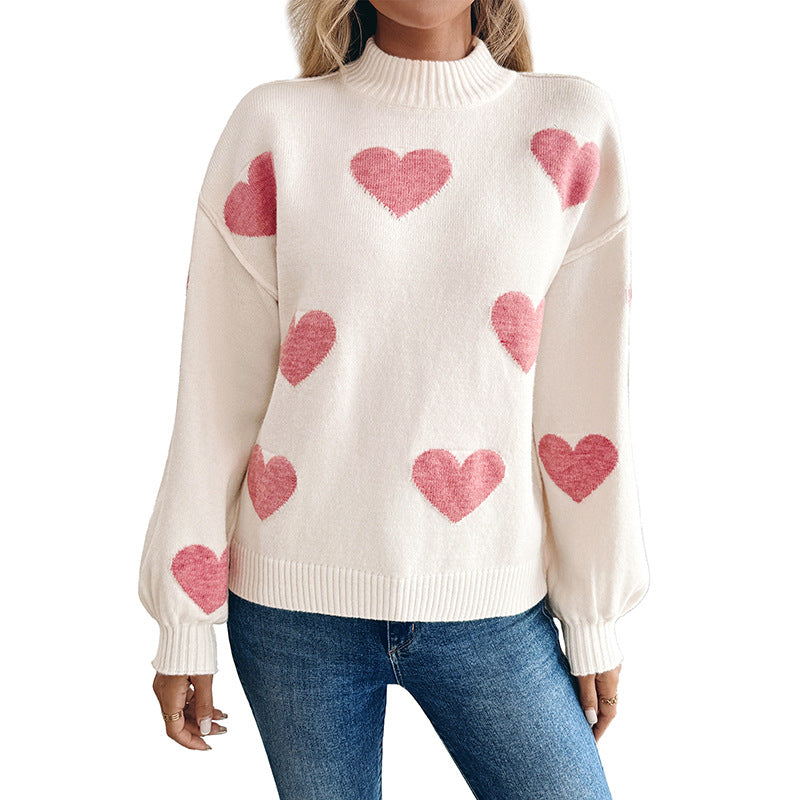 Pull col montant crème à cœurs roses pour femme