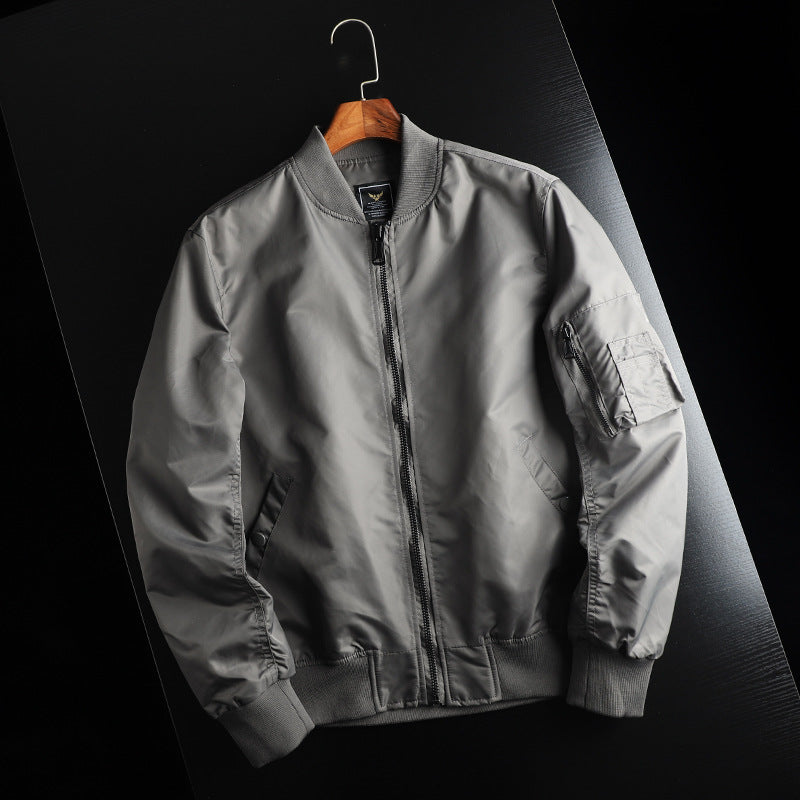 Men's solid-color bomber jacket with zippered pockets