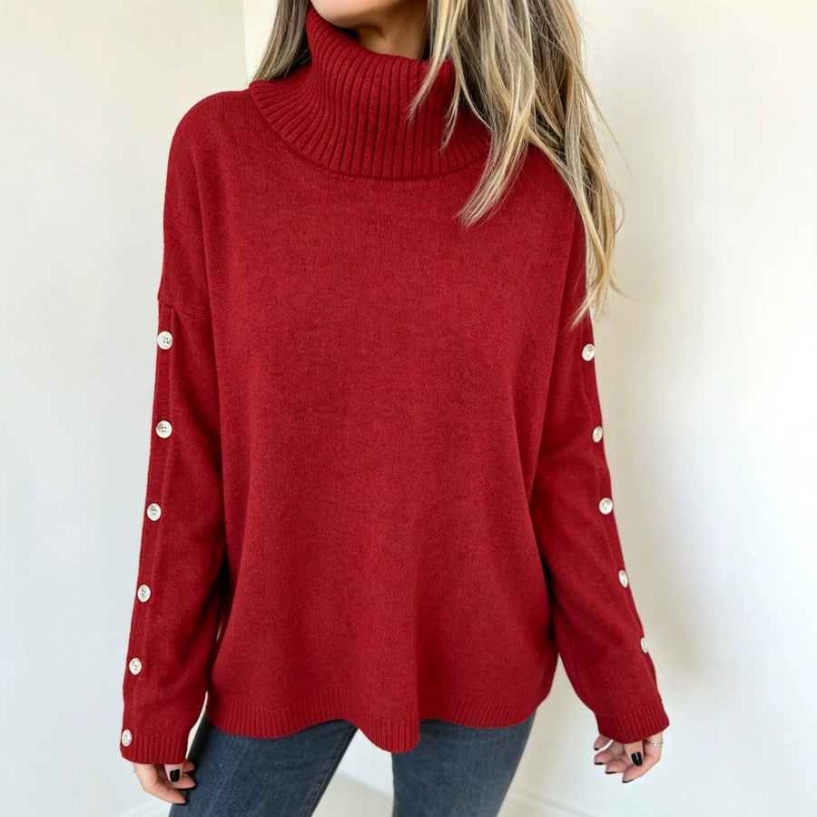 Jersey de cuello alto beige para mujer con botones decorativos en las mangas