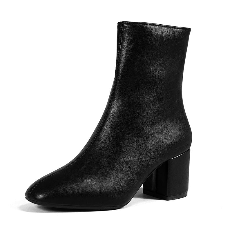 Damesbottines met blokhak en spitse neus, met rits aan de zijkant