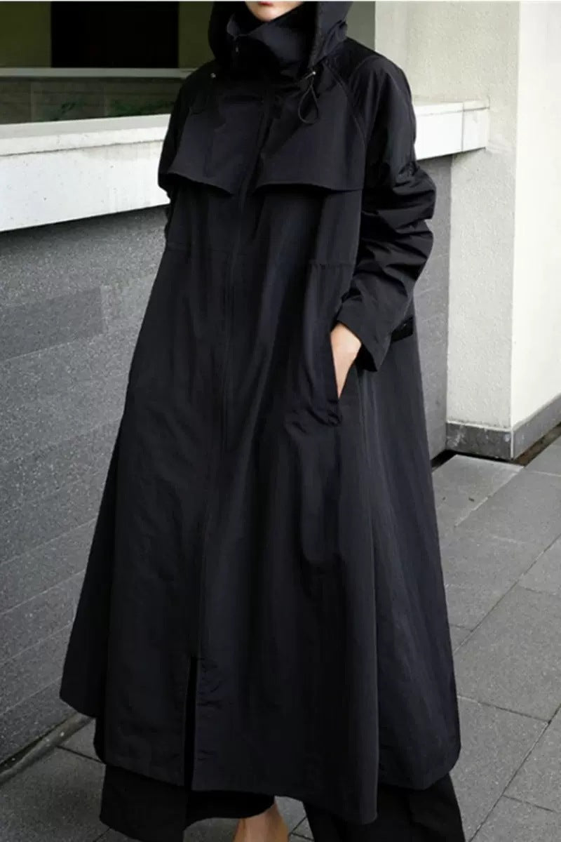 Long black hooded coat with a waist drawstring, casual style