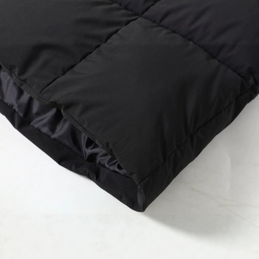 Manteau long matelassé noir à capuche et bordure effet fourrure