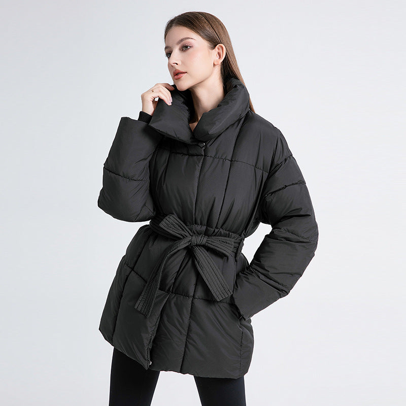 Women's short black quilted puffer coat with stand collar and belt