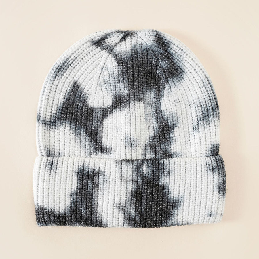 Tie-dye-mössa i ribbstickat material