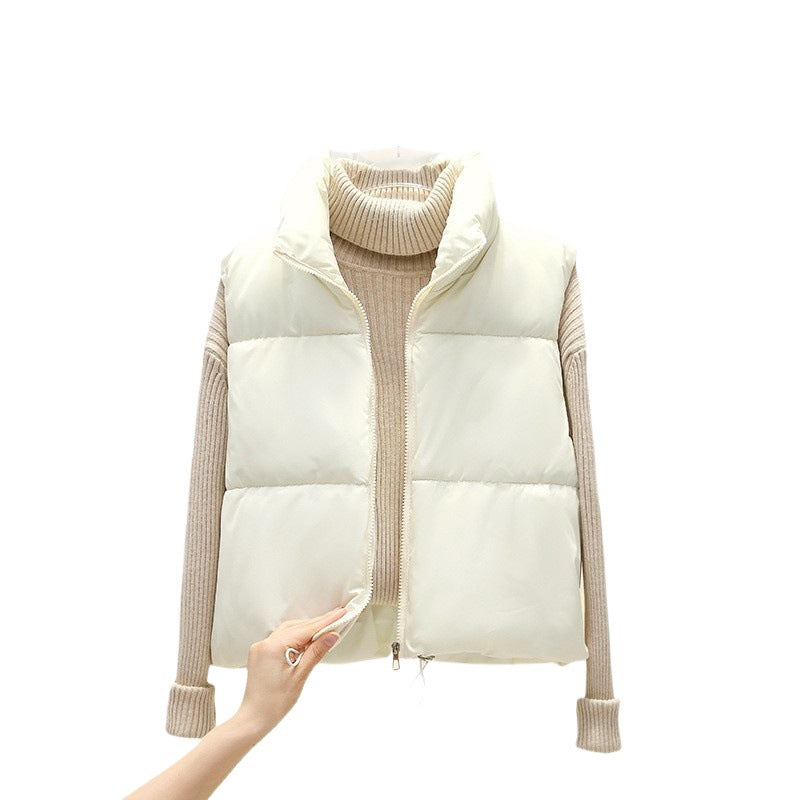 Korte doorgestikte damesbodywarmer zonder mouwen met ritssluiting