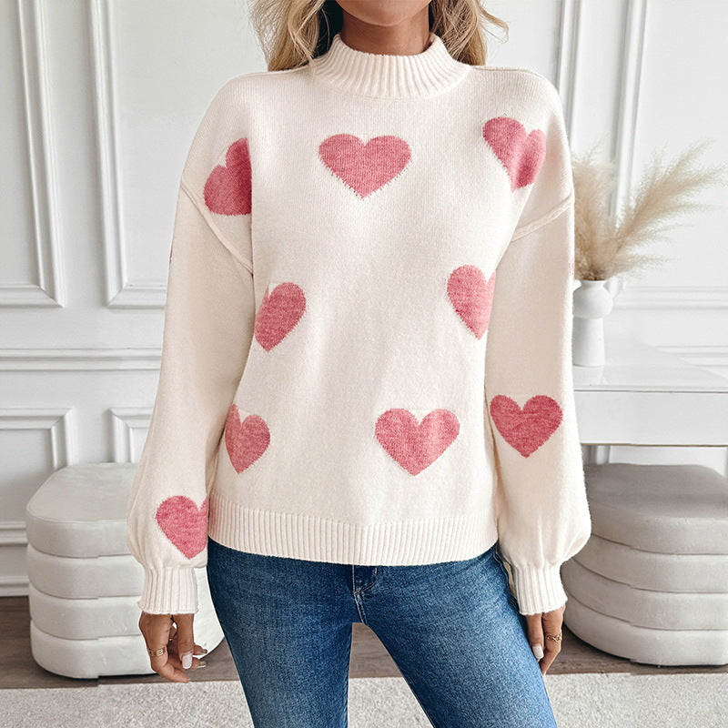 Pull col montant crème à cœurs roses pour femme