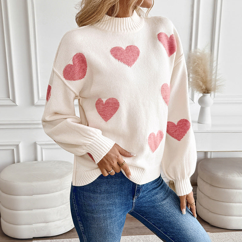 Pull col montant crème à cœurs roses pour femme