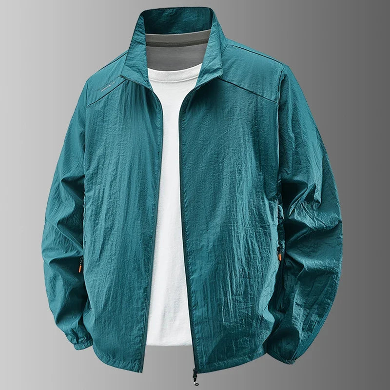 Chaqueta ligera lisa para hombre, cuello alto, corte informal y cierre de cremallera