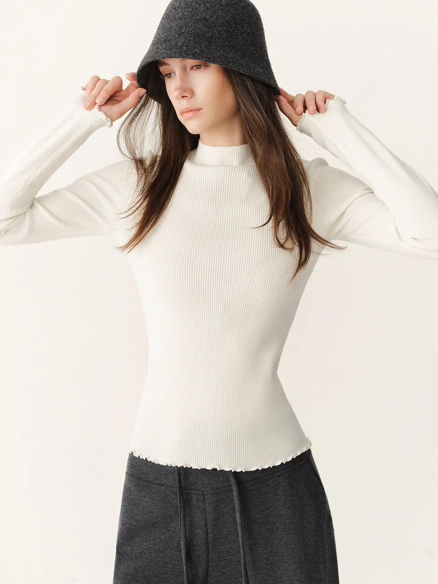 Top acanalado de cuello alto y manga larga para mujer, con bordes ondulados