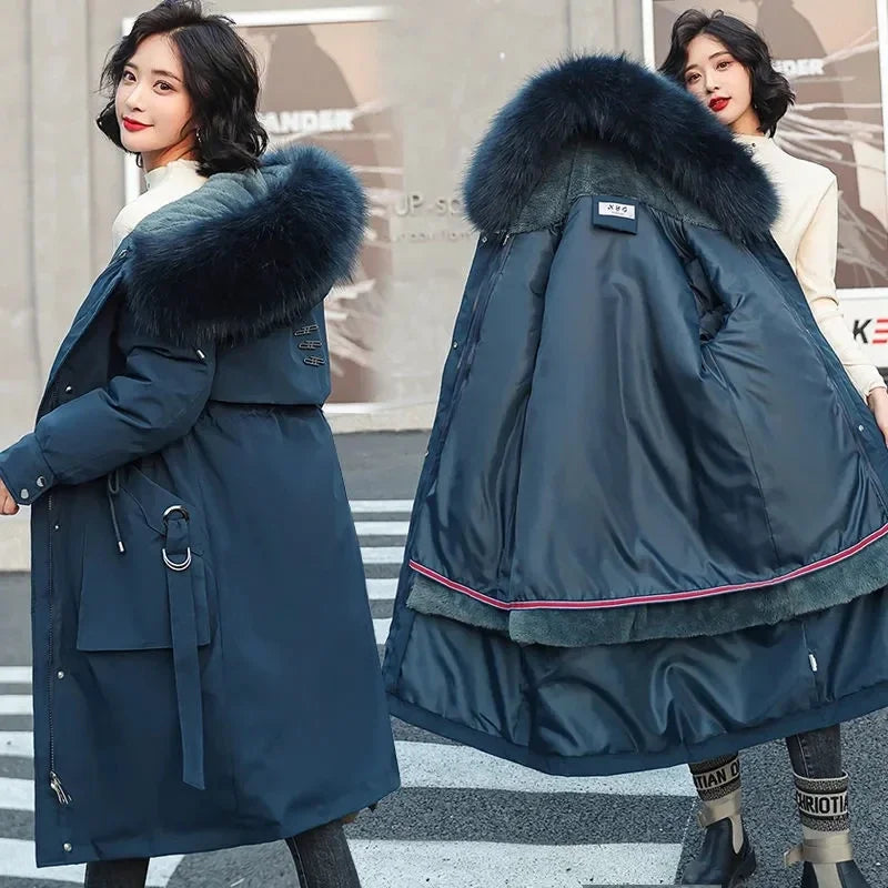 Women's long quilted parka coat with a faux-fur-trimmed hood and removable lining
