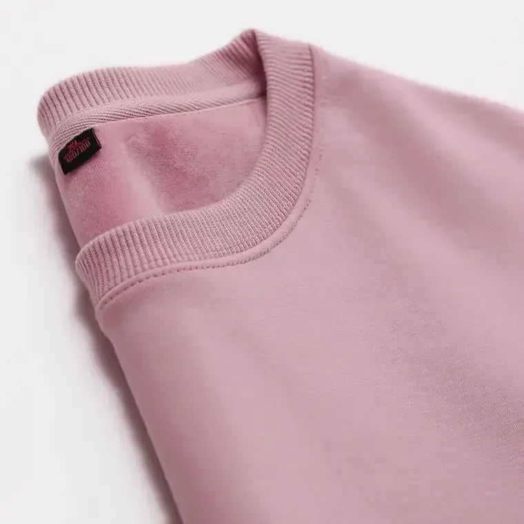 Sweat-shirt col rond doublure douce aspect peluche couleur unie