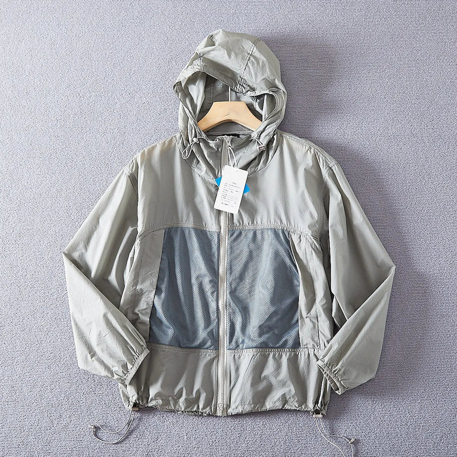 Giacca leggera unisex con cappuccio e inserti traspiranti