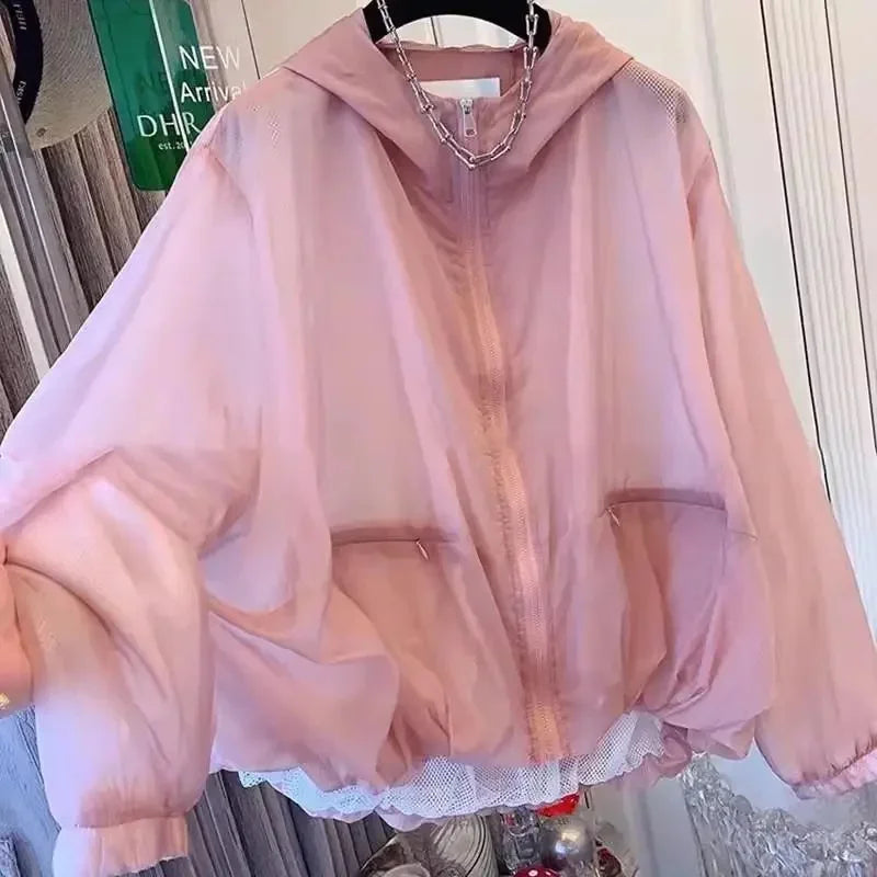 Lätt enfärgad damjacka med huva, vindtät och transparent dragkedja