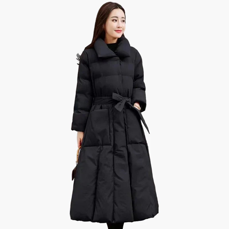 Lang, elegant dunjakke til dame – figursydd og chic vinterstil