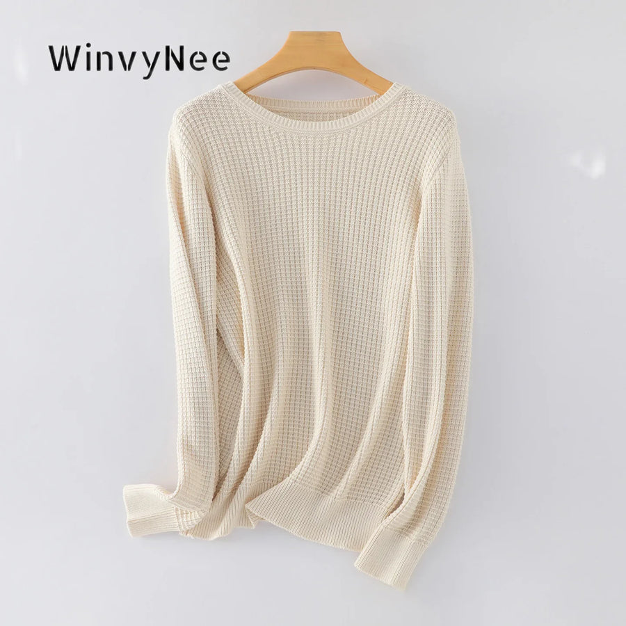 Jersey de punto gofrado de manga larga y cuello redondo para mujer