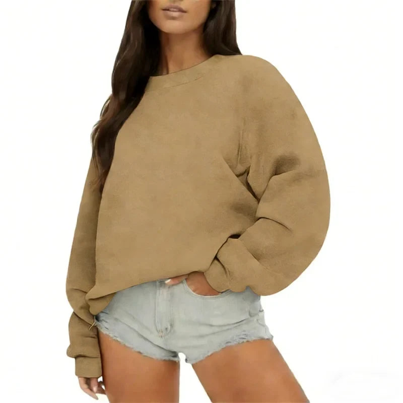 Ensfarvet, løstsiddende sweatshirt til kvinder med rund hals og lange ærmer