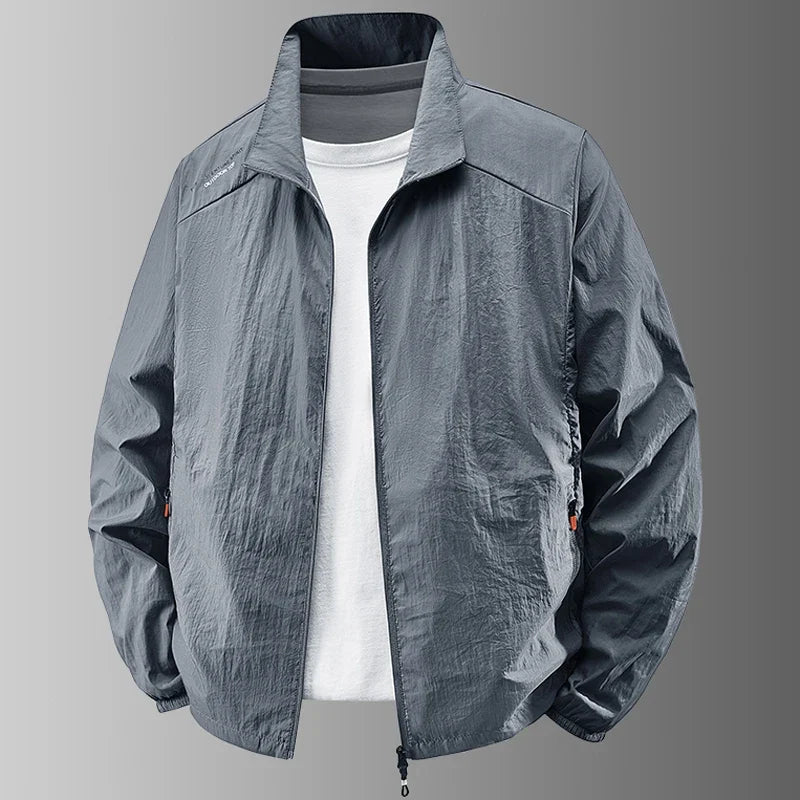 Chaqueta ligera lisa para hombre, cuello alto, corte informal y cierre de cremallera