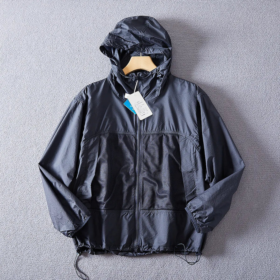 Giacca leggera unisex con cappuccio e inserti traspiranti