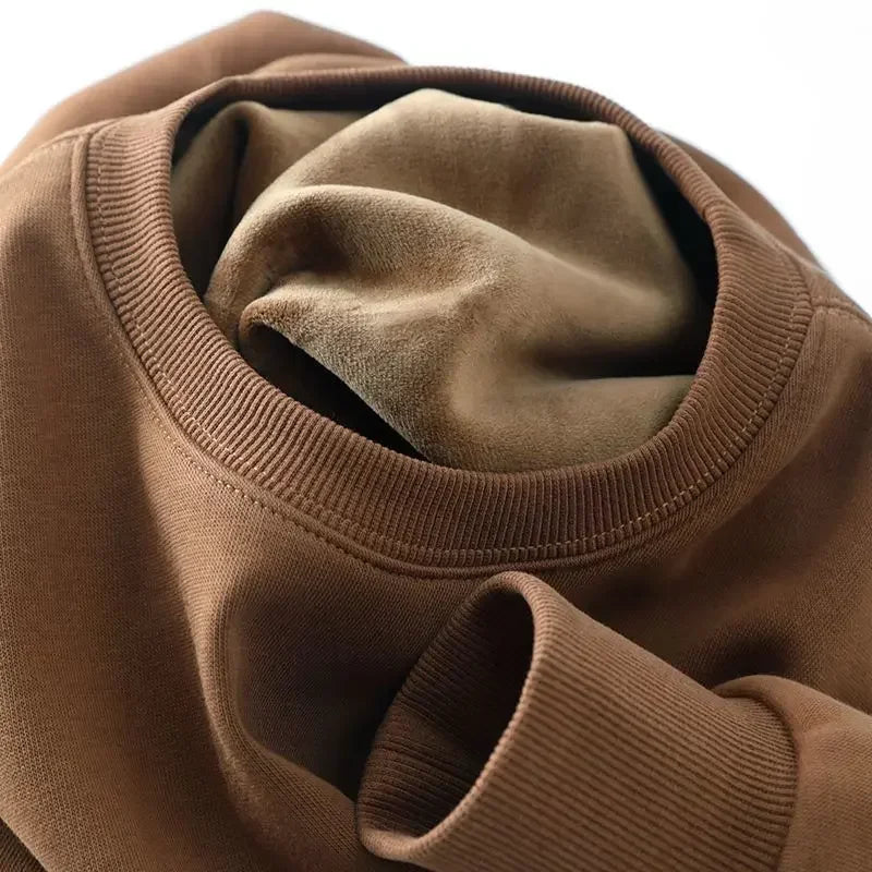 Sweat-shirt col rond doublure douce aspect peluche couleur unie