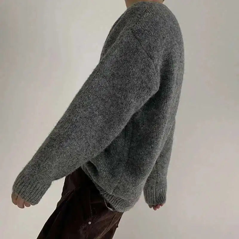Jersey de hombre de punto gris jaspeado con cuello redondo