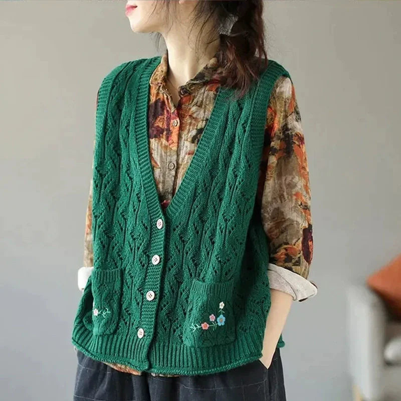 Women's open-knit sleeveless vest with V-neck, buttons, and floral embroidery