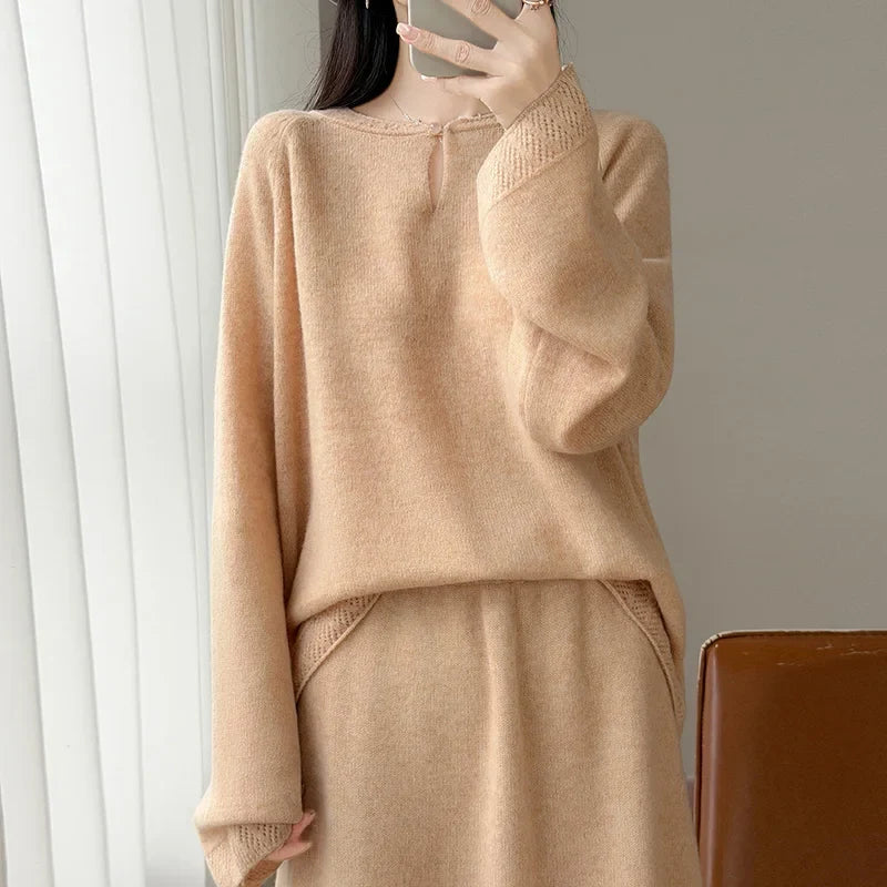 Maglione da donna in maglia morbida con collo rotondo, maniche lunghe e colore rosa chiaro