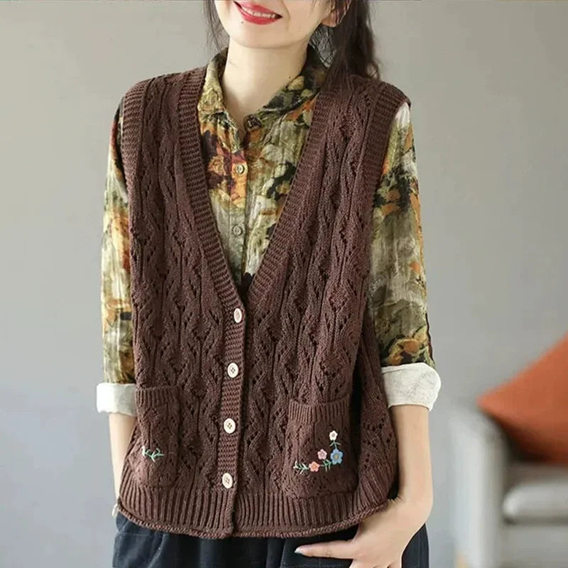 Women's open-knit sleeveless vest with V-neck, buttons, and floral embroidery