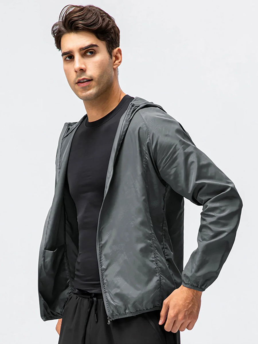Veste coupe-vent légère à capuche pliable pour homme