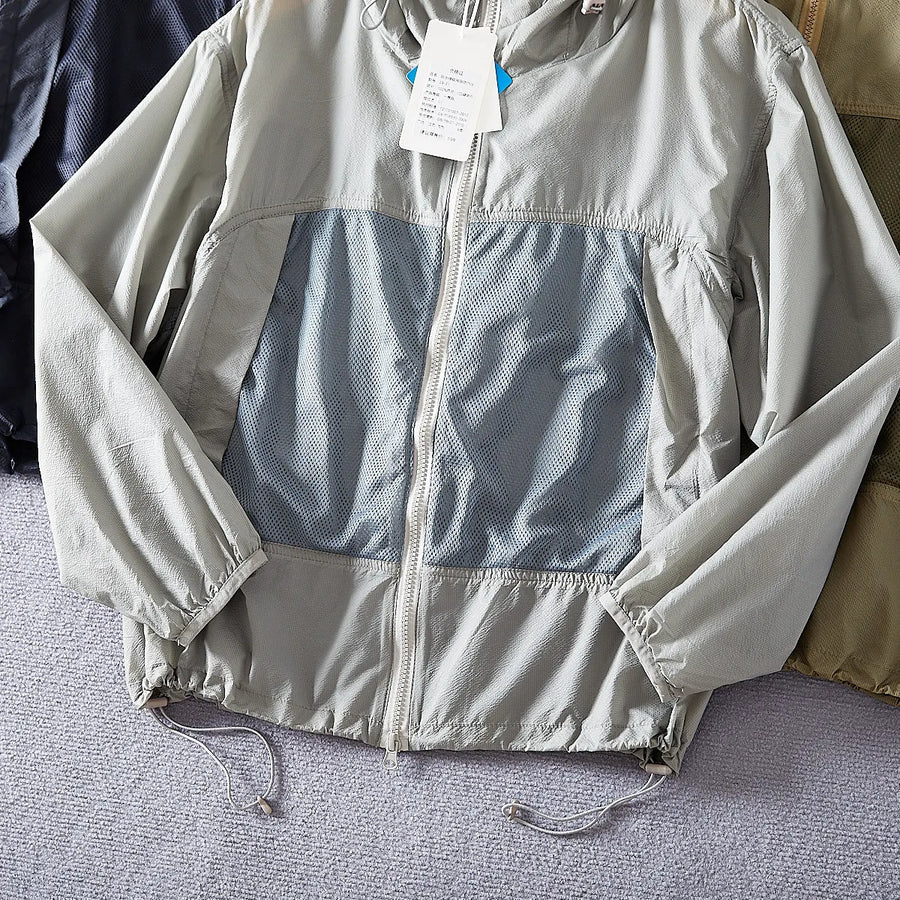 Giacca leggera unisex con cappuccio e inserti traspiranti