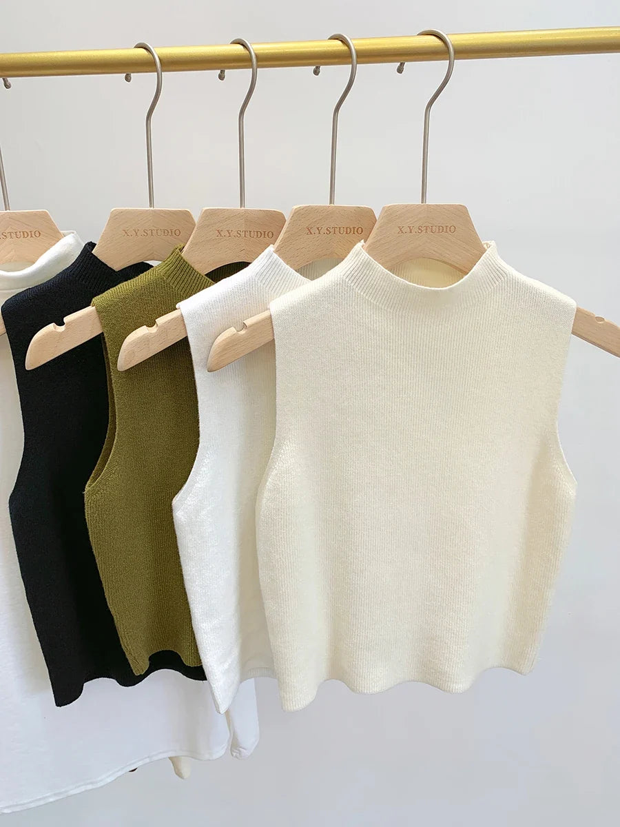 Women's plain knitted sleeveless turtleneck