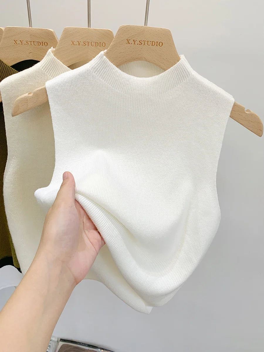 Women's plain knitted sleeveless turtleneck