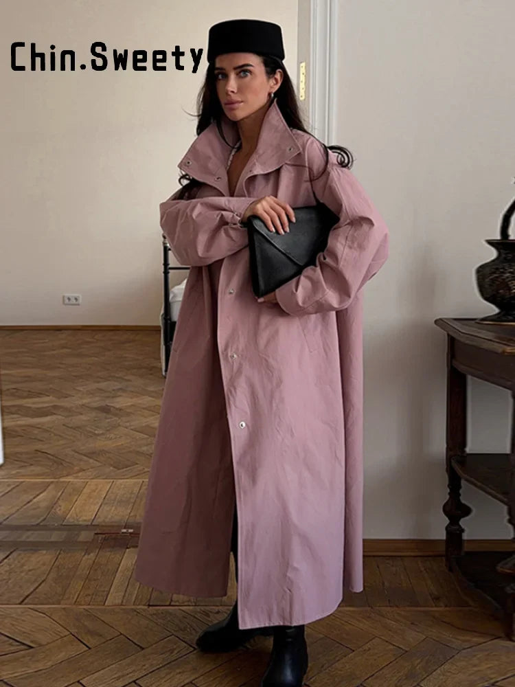 Trench-coat lungo da donna dalla vestibilità ampia ed elegante, con collo alto e maniche a sbuffo