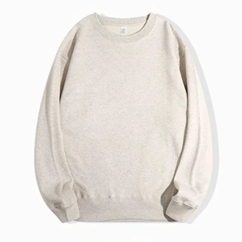 Avslappnad sweatshirt med rund hals och långa ärmar i ljusmelerad färg