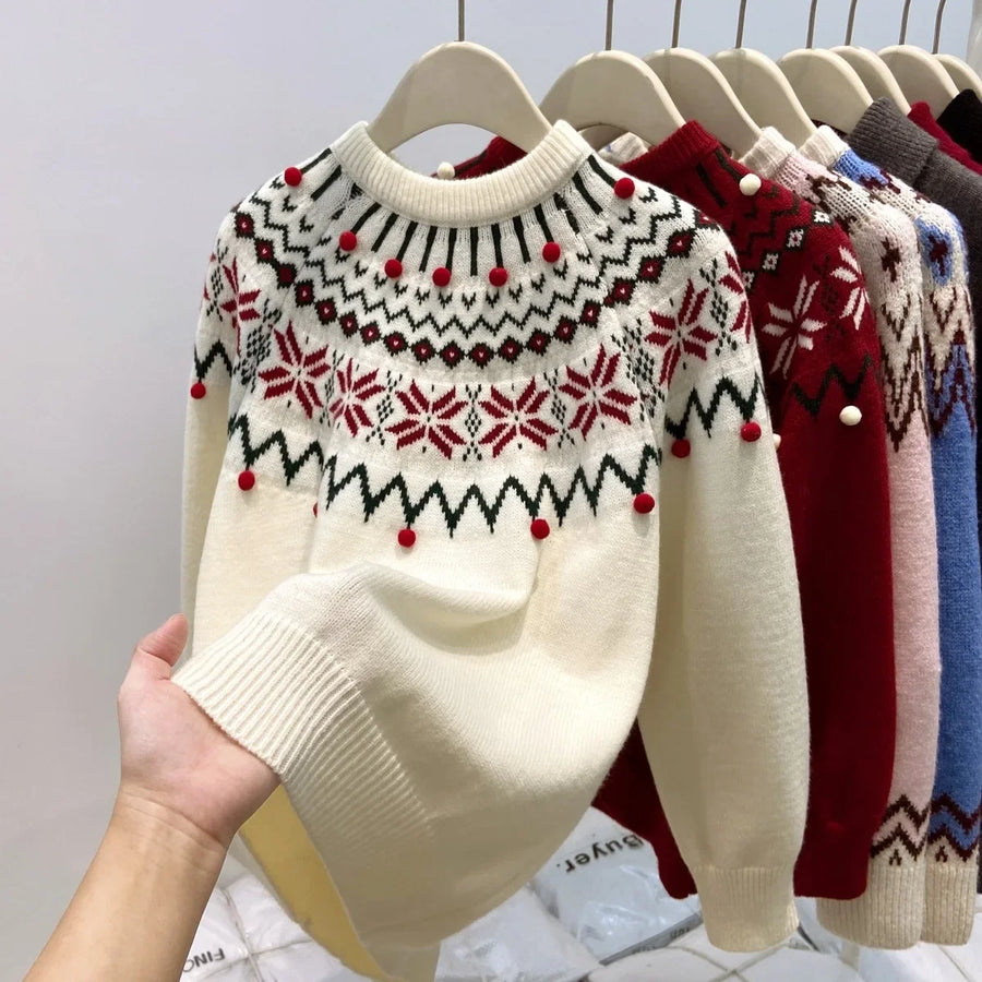 Vinter-jacquardsweater i strik til kvinder med snefnugsmønster og dekorative pomponer