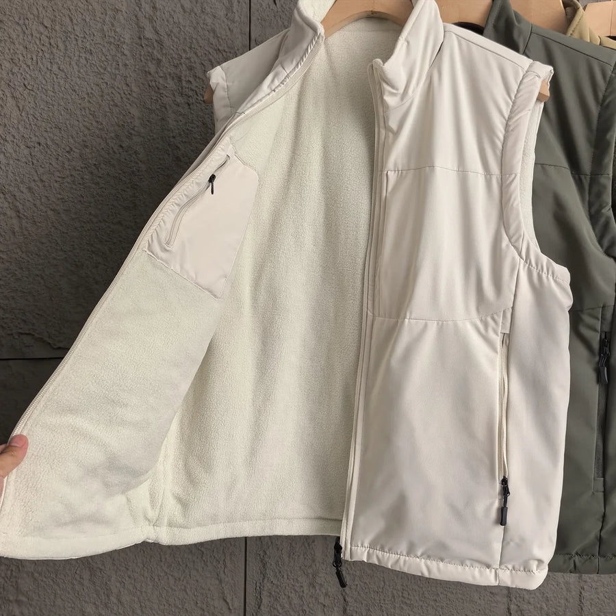 Chaleco negro acolchado para hombre, sin mangas, con cuello alto y bolsillos con cremallera