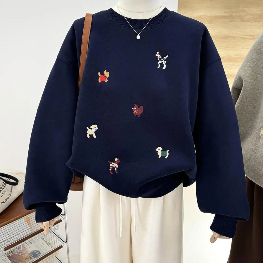Comfortabel damessweatshirt met ronde hals, geborduurde hondenmotieven en lange mouwen