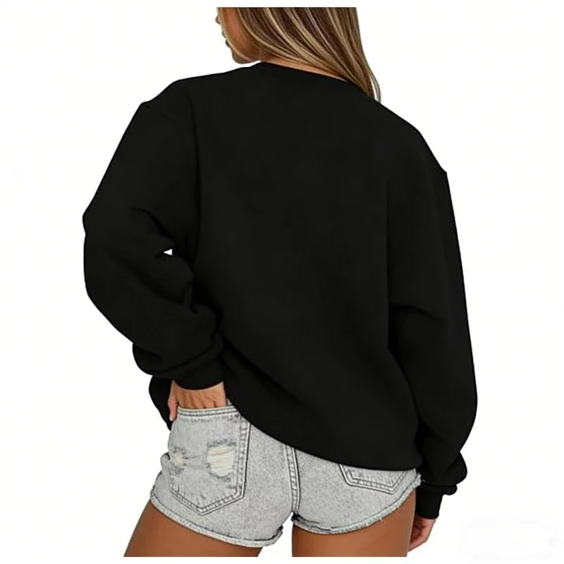 Ensfarvet, løstsiddende sweatshirt til kvinder med rund hals og lange ærmer