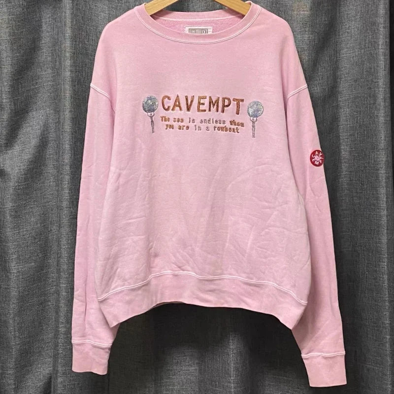 Unisex crew-neck sweatshirt with a graphic design, available in several colors and sizes