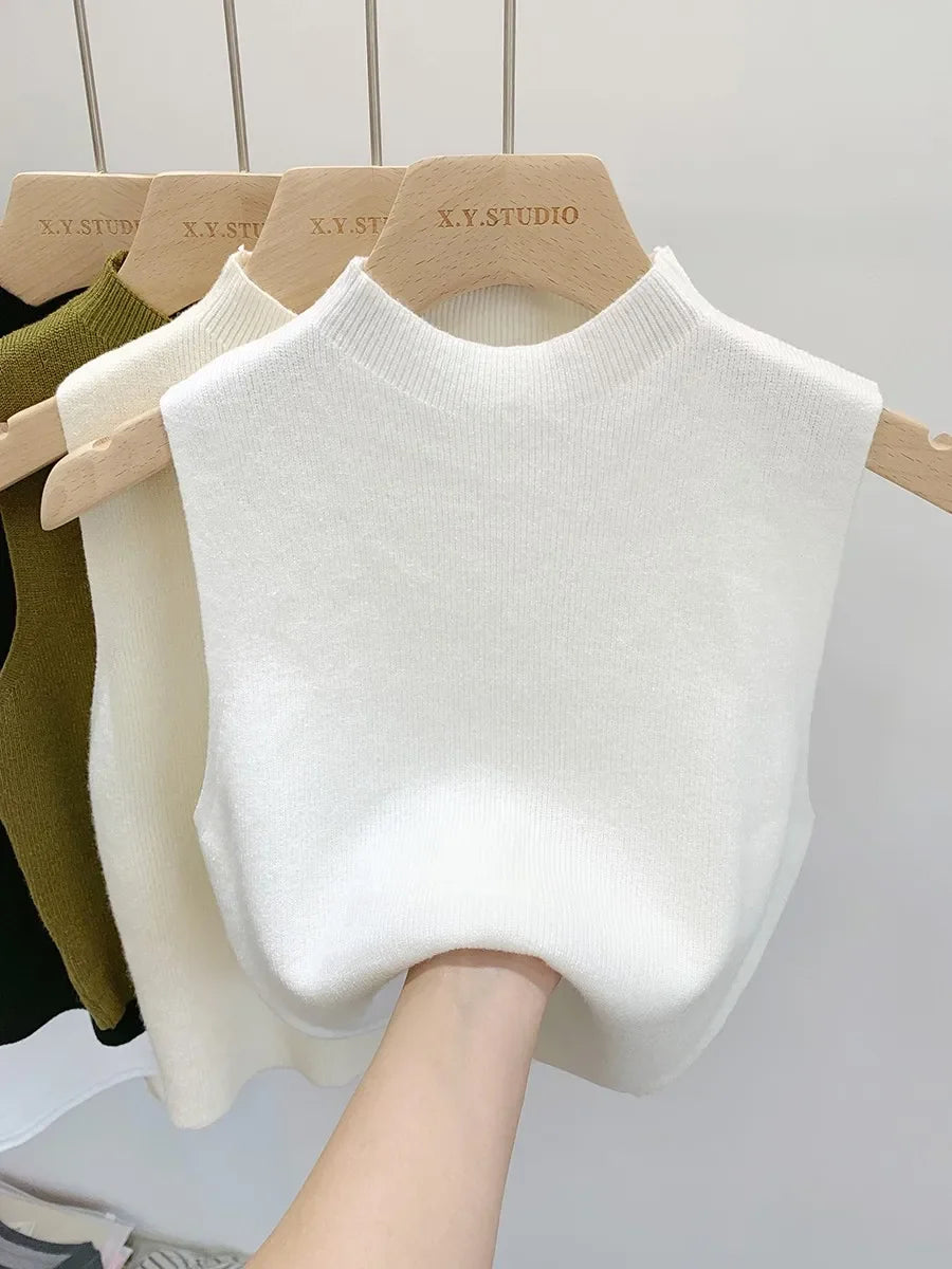 Women's plain knitted sleeveless turtleneck