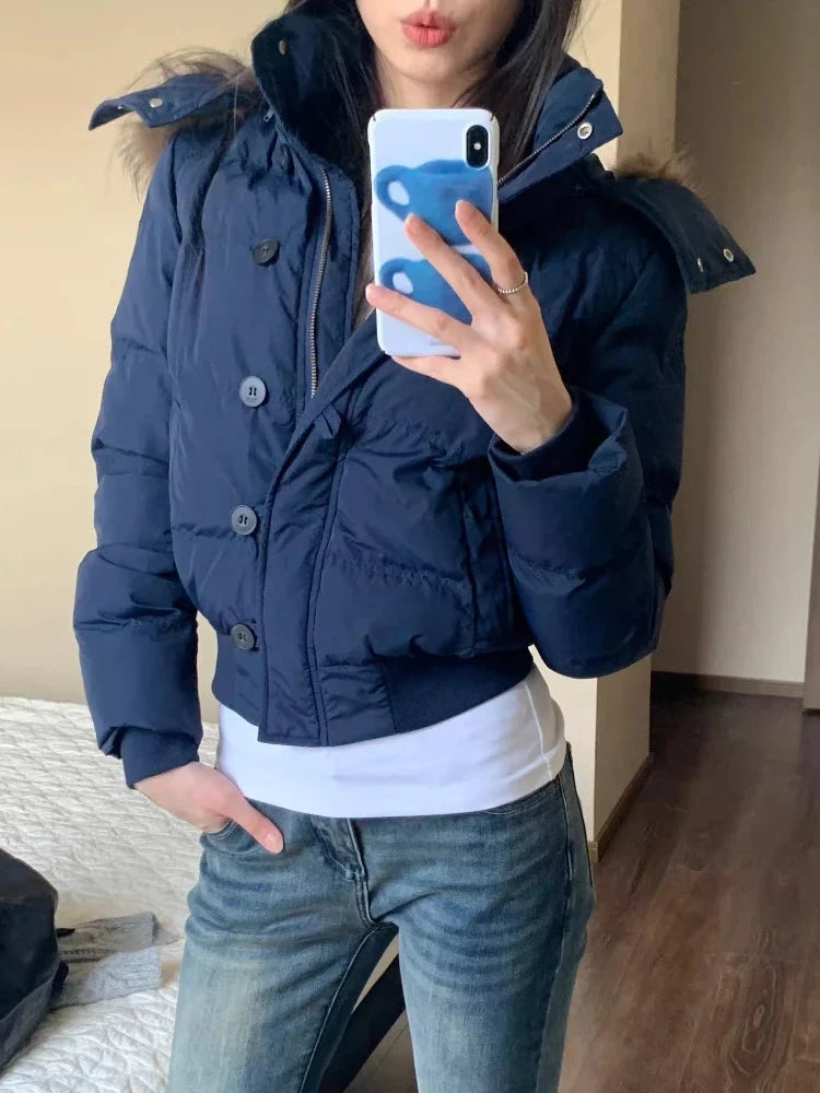 Piumino corto da donna con cappuccio in ecopelliccia blu navy