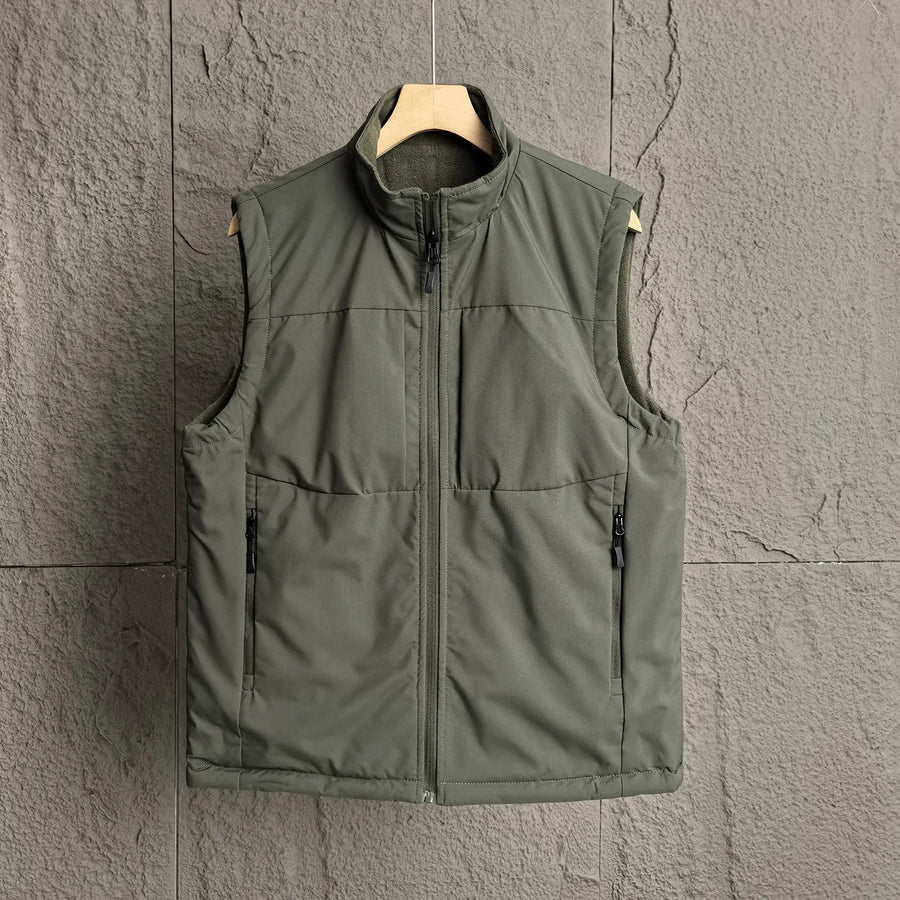 Chaleco negro acolchado para hombre, sin mangas, con cuello alto y bolsillos con cremallera