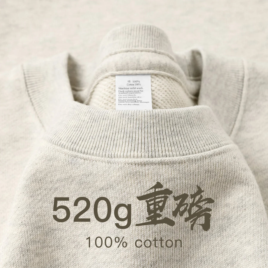 Avslappnad sweatshirt med rund hals och långa ärmar i ljusmelerad färg