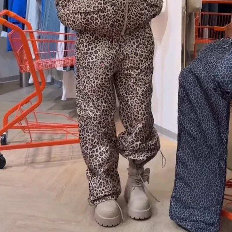 Oversized vatteret dunjakke til kvinder med hætte og print