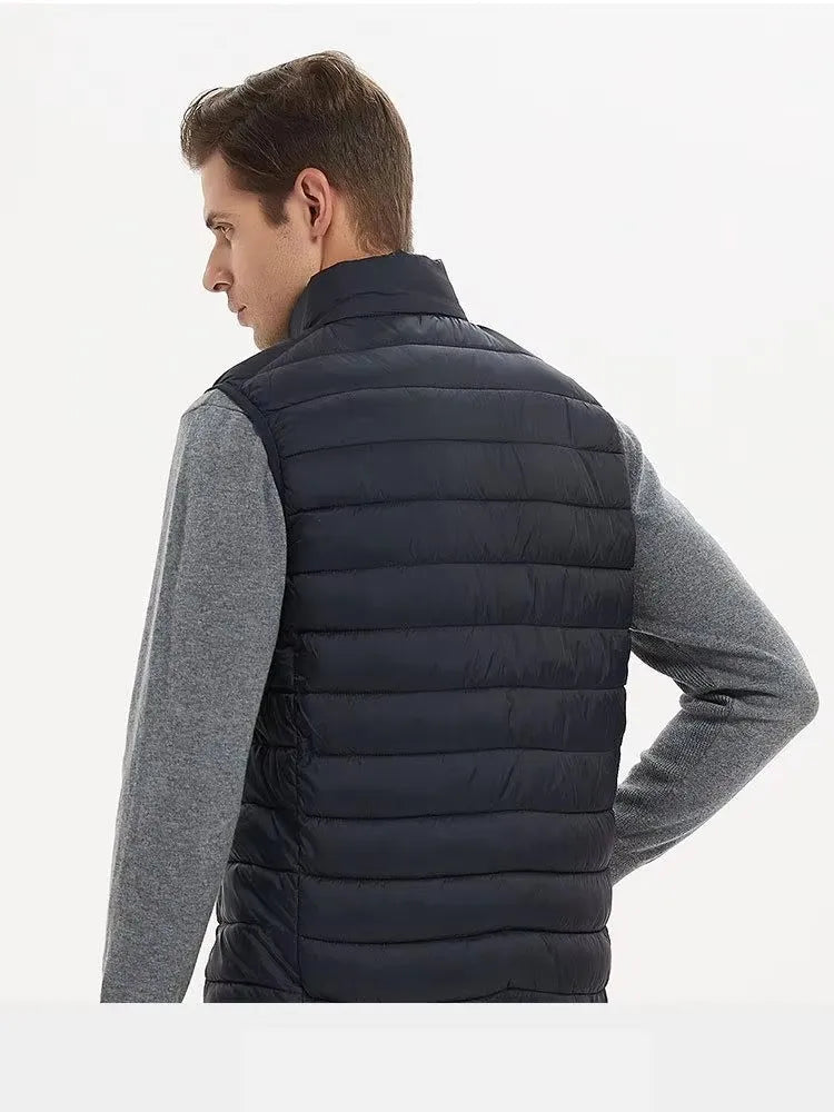 Chaleco acolchado ligero de hombre, con cuello alto, cremallera y colores lisos